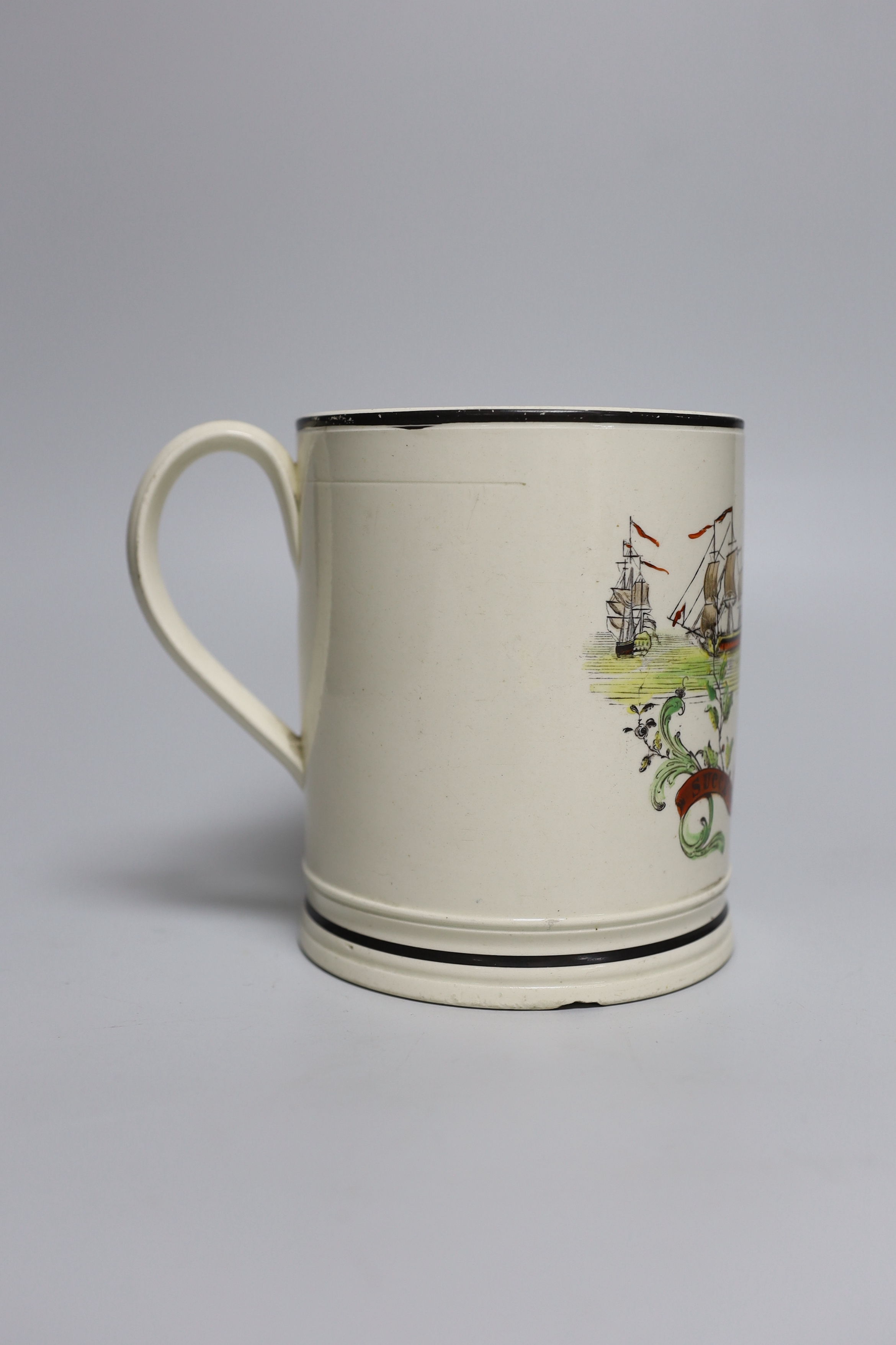 A rare late 18th century creamware cylindrical mug inscribed 'Success to Adml. Nelson’, 14cm high